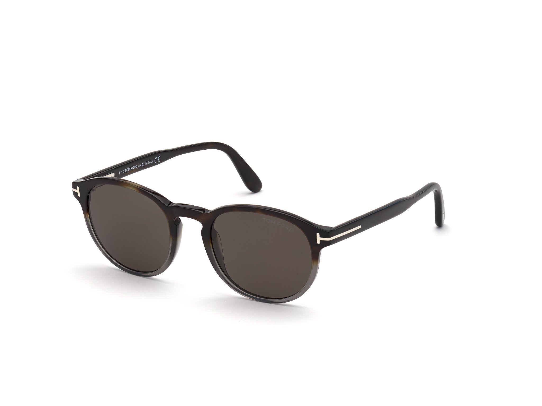 Das Bild zeigt die Sonnenbrille FT0834 der Marke Tom Ford in havanna grau von der Seite.