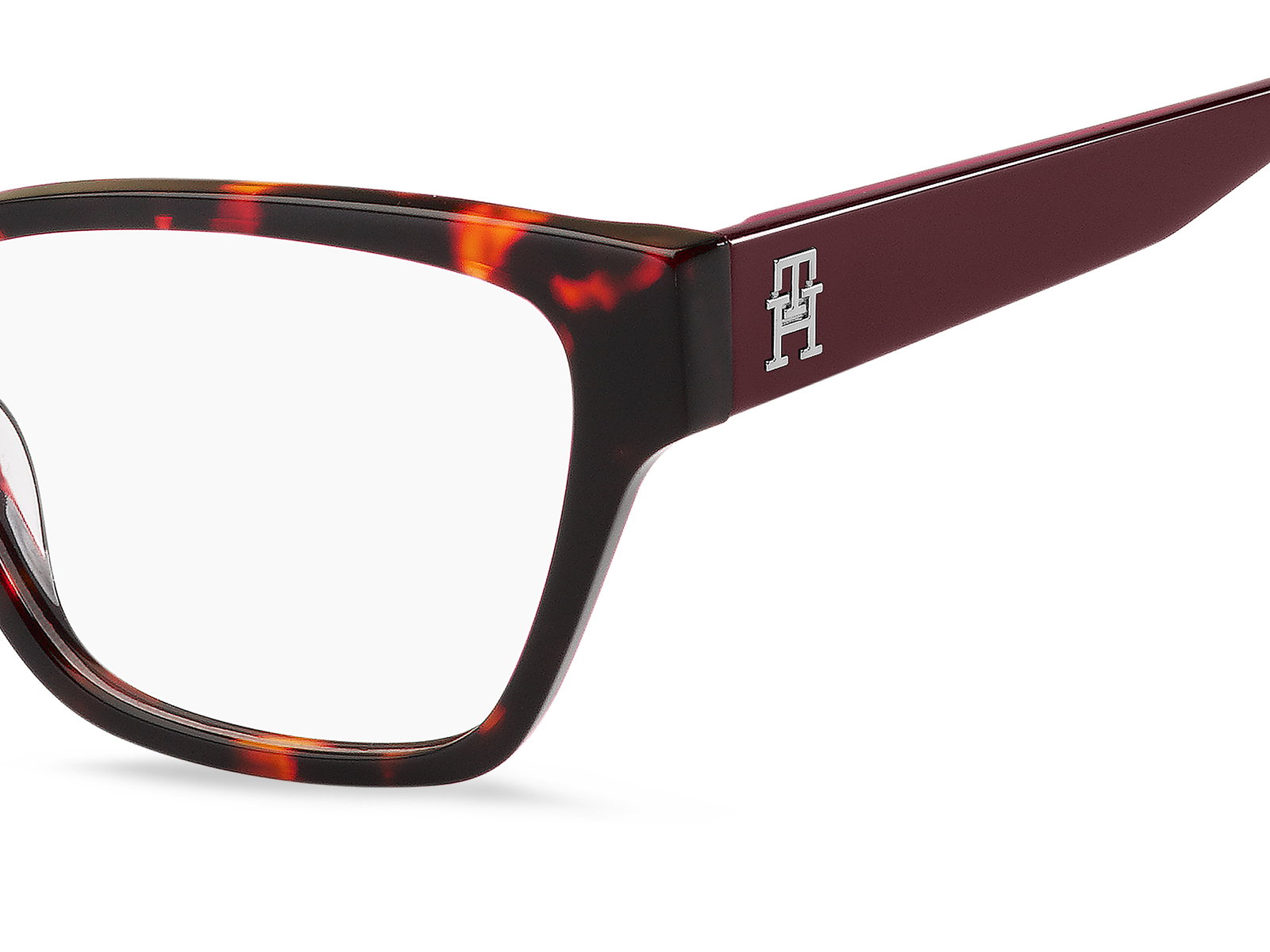 Das Bild zeigt die Cat-Eye-Brille TH2000 0UC für Damen von der Marke Tommy Hilfiger in havanna rot seitlich