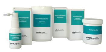 Das Bild zeigt verschiedene Produkte zur Pflege und Reinigung von Hörgeräten.