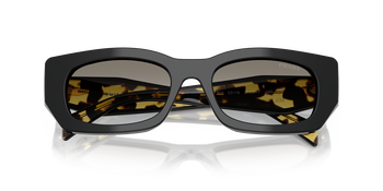 Auf diesem Bild sehen Sie die Prada Sonnenbrille 0PR B05S in der Farbe Schwarz.