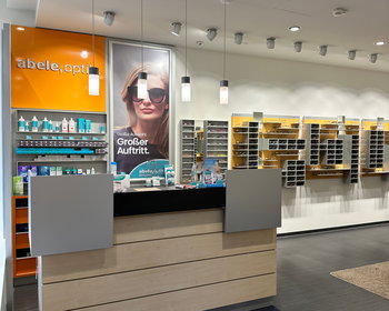 Das Bild zeigt den Kassenbereich unserer Filiale in Rosenheim.