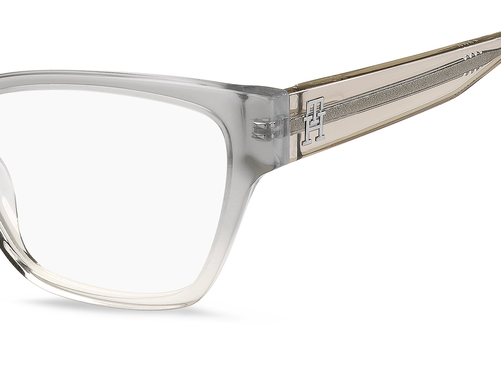 Das Bild zeigt die Cat-Eye-Brille TH2000 KB7 53 für Damen von der Marke Tommy Hilfiger in grau transparent von rechts