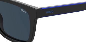 Das Bild zeigt die Sonnenbrille HG1297/S D51 von der Marke Hugo in blau/schwarz.